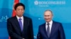  Russian President Vladimir Putin, right, and Chairman of National People's Congress Li Zhanshu prior to their talks on the sidelines of the Eastern Economic Forum in Vladivostok on September 7, 2022. (Associated Press)
