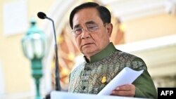 FILE - Thai prime minister Prayut Chan-ocha speaks to the press after a cabinet meeting at Government House in Bangkok on May 16, 2023. 