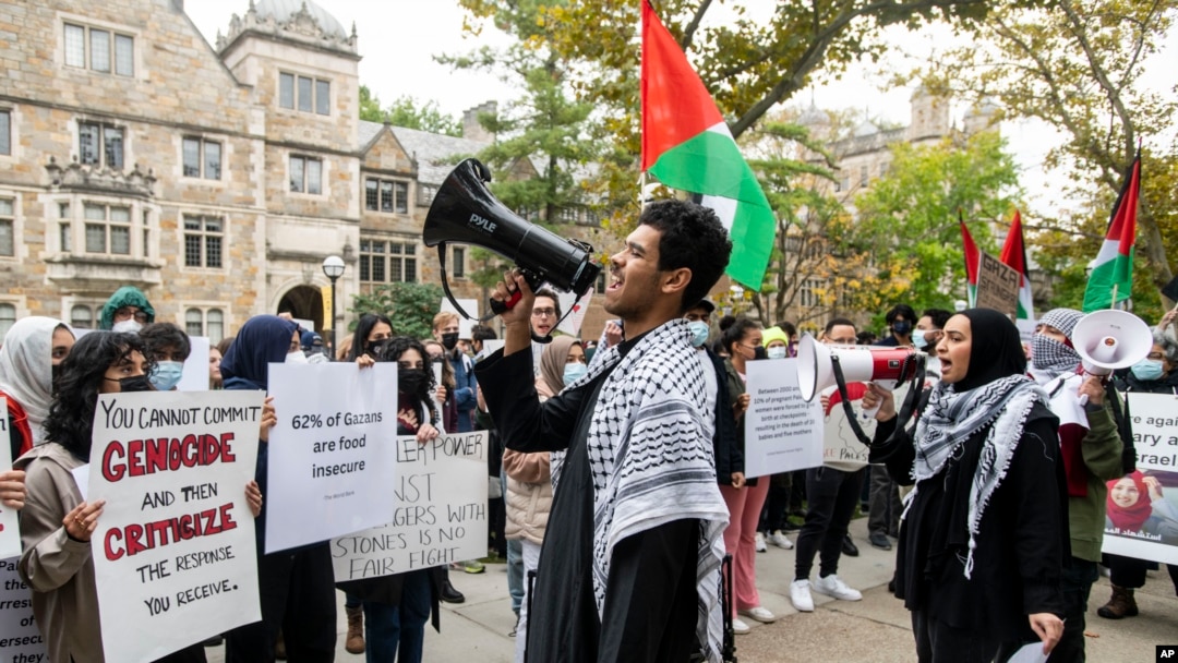 FILE - Pro-Palestinian demonstrators gather to protest University of Michigan President Santa Ono's "Statement regarding Mideast violence" outside the University of Michigan President's House, Oct. 13, 2023, in Ann Arbor, Mich. 
