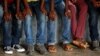 FILE - Congolese children used in armed conflicts and former child soldiers receive psycho-social support at the Centre for Orientation and Transit for Children associated with militias in Mbuji Mayi, in the Democratic Republic of Congo, March 14, 2018.