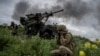 Ukrainian service members fire a Caesar self-propelled howitzer towards Russian troops near the town of Avdiivka in the Donetsk region on May 31, 2023. (Viacheslav Ratynskyi/Reuters)
