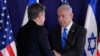 U.S. Secretary of State Antony Blinken, left, and Israel's Prime Minister Benjamin Netanyahu shake hands after their statements to the media inside The Kirya, which houses the Israeli Ministry of Defense, after their meeting in Tel Aviv on October 12, 2023. (Jacquelyn Martin/AP)