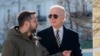 President Joe Biden, right, and Ukrainian President Volodymyr Zelenskyy talk during an unannounced visit in Kyiv, Ukraine, Feb. 20, 2023. (Ukrainian Presidential Press Office via AP)