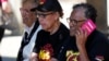 FILE - Indigenous women sit at a polling place in Redfern as Australians cast their final votes in Sydney, Oct. 14, 2023, in their first referendum that aims to tackle Indigenous disadvantage by enshrining in the constitution a new advocacy committee. 