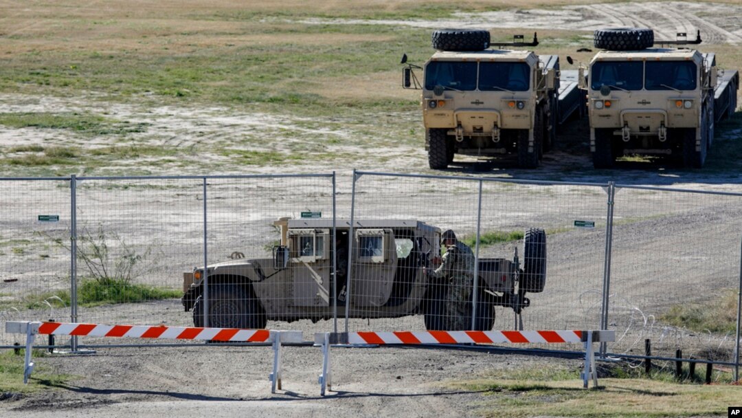 A Texas Department of Public Safety officer guards an entrance to Shelby Park, Jan. 11, 2024, in Eagle Pass, Texas. 