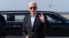 President Joe Biden talks to reporters upon his arrival to Joint Base Andrews, Md., en route to the White House, Aug. 18, 2024. 