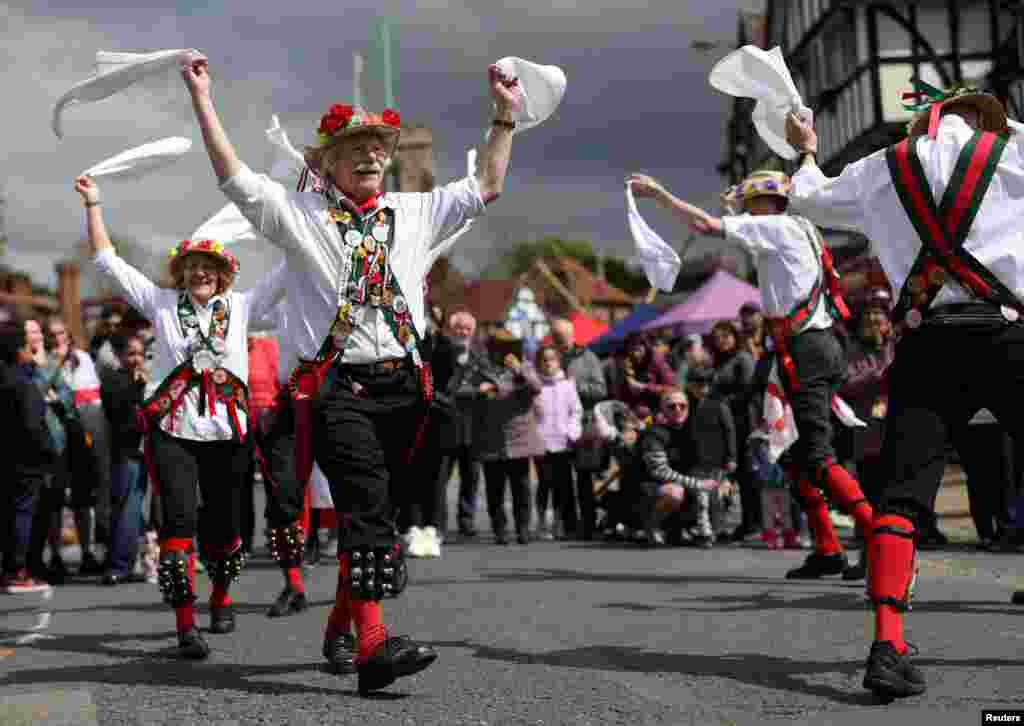 People perform during the St. George's Day celebration in northwest London.