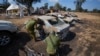 Israeli soldiers inspect the site of a music festival near the border with the Gaza Strip in southern Israel, on October 13, 2023, where at least 260 festival-goers were killed during the attack by Hamas gunmen on October 7. (AP Photo/Ariel Schalit/AP)