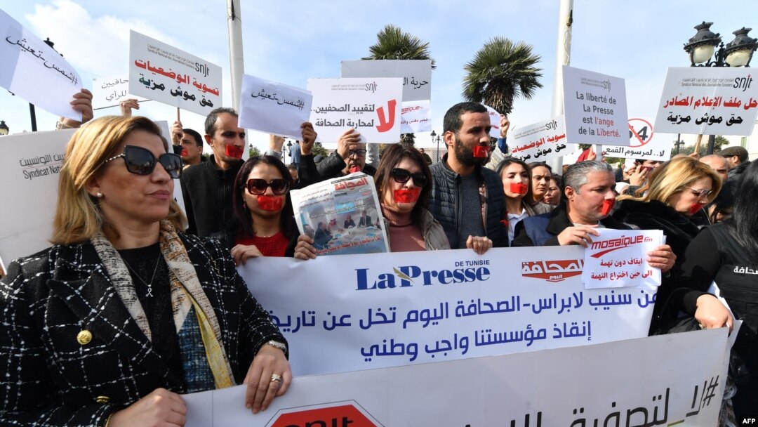 Tunisian journalists protest in front of the Prime Minister's office in Tunis, Feb. 16, 2023, in defense of freedom of expression and against the persecution of journalists.
