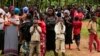 Watu walionusurika katika shambulizi baya la ADF katika mji wa Beni, Novemba 29, 2019. Picha ya AFP