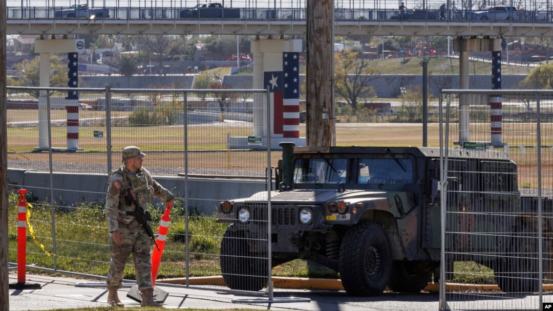 Texas Department of Public Safety officers guard an entrance to Shelby Park on Jan. 11, 2024, in Eagle Pass, Texas.