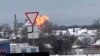 Image capture from a video showing flames rising at the scene of a Russian military transport plane that crashed near Yablonovo, Belgorod region, Russia, on January 24, 2024. (Validated UGC video/AP)