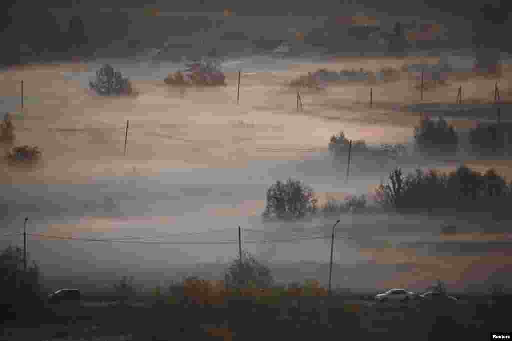 A morning fog is seen in the Siberian city of Omsk, Russia, Oct. 8, 2019.