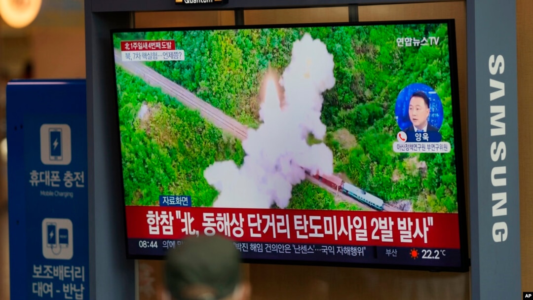 A TV showing a report about North Korea's missile launch with file footage is seen at the Seoul Railway Station in South Korea, Oct. 1, 2022. On Saturday, North Korea fired two short-range ballistic missiles toward its eastern waters, South Korean and Japanese officials said.