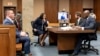 La fiscal del condado de Fulton, Fani Willis, en el centro, y su equipo, durante los procedimientos para establecer un gran jurado especial en el condado de Fulton, Georgia, el 2 de mayo de 2022, para investigar las acciones del expresidente Donald Trump y sus partidarios.