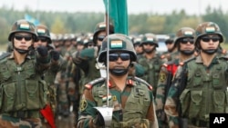 In this handout photo released by the Russian Defense Ministry Press Service, Indian soldiers march during the opening ceremony of Zapad-2021 at the Mulino training ground in the Nizhny Novgorod region, Russia, Sept. 9, 2021.