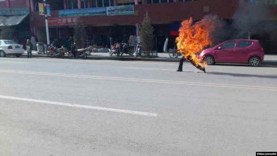 Citizen journalist image shows Tibetan man self-immolating in Labrang, China, October 23, 2012.