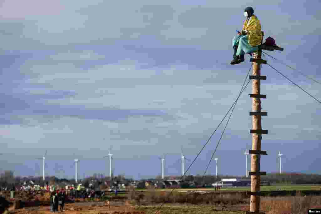 An activist protest against demolition of Luetzerath for the expansion of the Garzweiler open-cast lignite mine of Germany&#39;s utility RWE, Jan. 8, 2023.