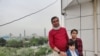 Afghan journalist Abdul Khalil Rasoli, pictured with his family in Herat, Afghanistan, before the Taliban take over. (Family handout)