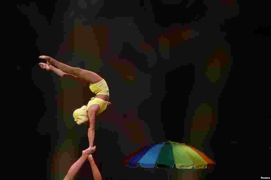Performers take part in a dress rehearsal of Cirque Du Soleil's new show 'Amora', an exclusive production for Malta inspired by its people and architecture, in Valletta, Nov. 23, 2022.