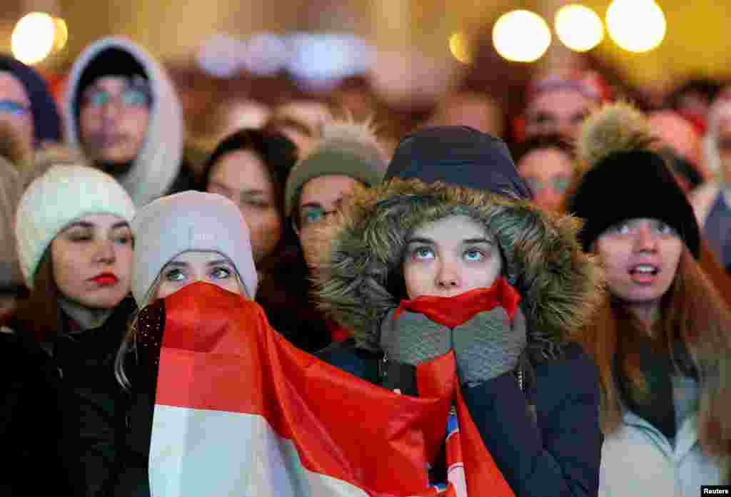 Croatia fans react at the Ban Josip Jelacic Square in Zagreb, Croatia, after Argentina's Julian Alvarez scores their second goal during a World Cup semifinal football match between Argentina and Croatia in Qatar, Dec. 13, 2022.