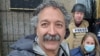 This image released by Fox News Channel shows cameraman Pierre Zakrzewski while on assignment with colleagues, Fox News correspondent Steve Harrigan and Jerusalem-based senior producer Yonat Friling, background right, in Kyiv. 