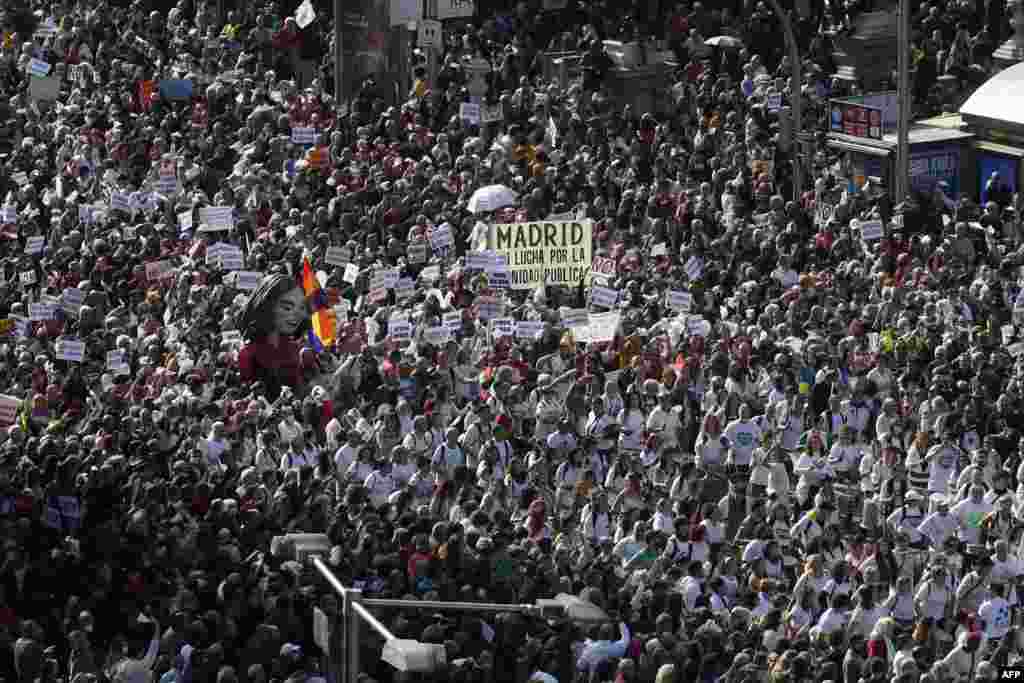 Hundreds of thousands of protesters march during a demonstration called by citizens under the slogan "Madrid stands up for its public health. Against the destruction of primary health care" in Madrid, Spain.