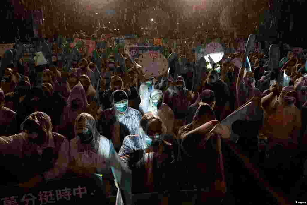 Supporters of the Democratic Progressive Party (DPP) attend a campaign rally ahead of the local elections, in Taipei, Taiwan.
