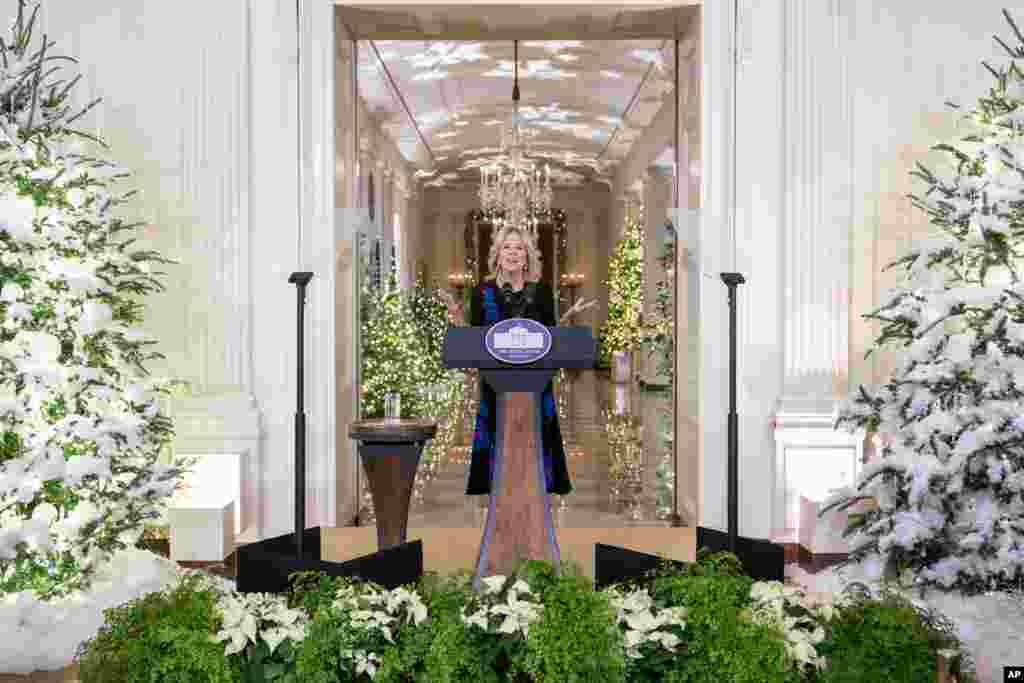 First lady Jill Biden speaks at an unveiling of this year's White House holiday theme and seasonal decor in the East Room at the White House in Washington.