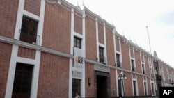 FILE -The exterior of the Palafoxiana library, in Puebla, Mexico, Sept. 13, 2022.
