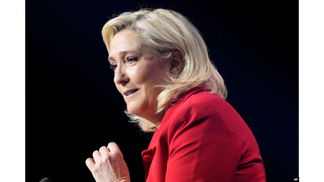FILE - French far-right leader Marine Le Pen delivers a speech during a meeting in Avignon, France, April 14, 2022. Le Pen is trying to unseat centrist President Emmanuel Macron.