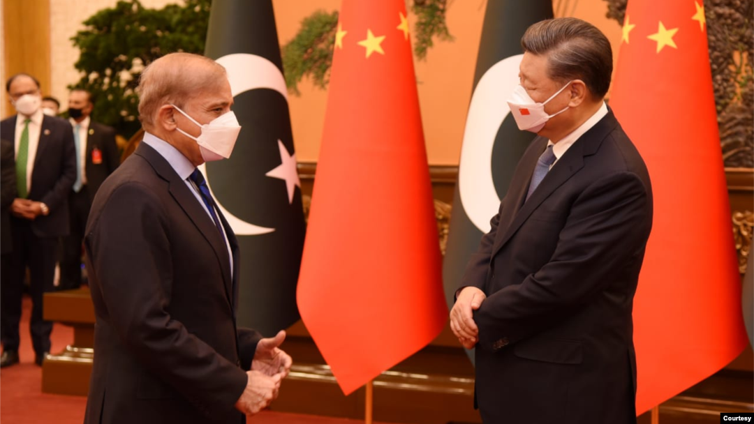 Chinese President Xi Jinping, right, and visiting Pakistani Prime Minister Shehbaz Sharif are seen during their talks in Beijing, China, Nov. 2, 2022. (Courtesy - Pakistan Government via Ayaz Gul)