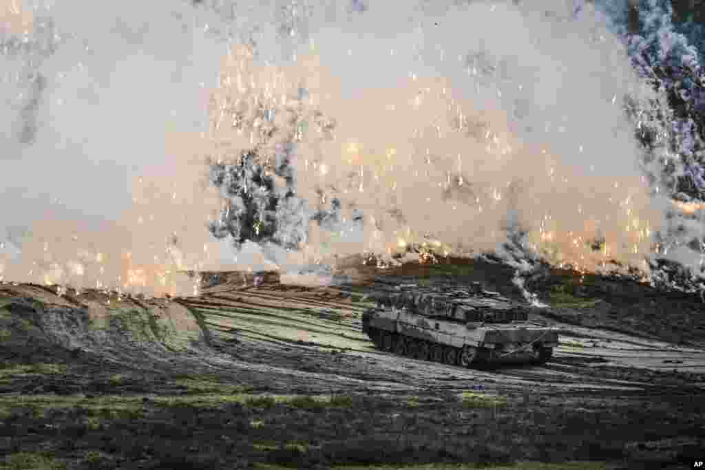 A Leopard 2 tank is seen in action during a visit by German Defense Minister Boris Pistorius to the Bundeswehr tank battalion 203 at the Field Marshal Rommel Barracks in Augustdorf, Germany.