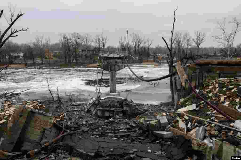 War-torn remnants of a bridge connecting the town of Sviatohirsk to the Sviatohirsk Cave Monastery remain, as Russia's attack on Ukraine continues, in Sviatohirsk, Ukraine.
