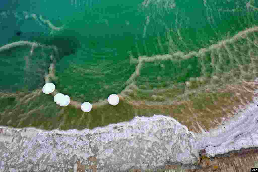 An aerial view shows a salt formation in the southern part of the Dead Sea near Israel's Neve Zohar resort, Jan. 9, 2023.