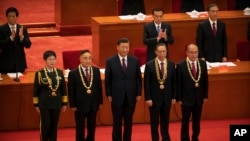 2020年9月8日，中共最高领导人习近平在北京人民大会堂向抗疫有功人员授勋。-美联社资料照