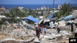 Eneo la shambulizi lililofanyika Jumamosi tarehe 29 Juni, 2024 katika kitongoji cha al-Mawasi mjini Rafah, kusini mwa Gaza (Picha na Eyad BABA / AFP)