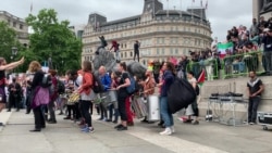Samba Drum Band Warms Up Protesters in London