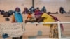 Deslocadas em Pemba. Foto: AFP