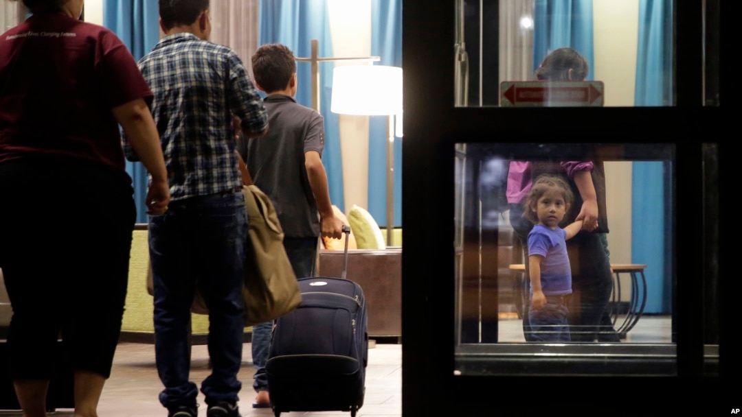 Immigrants seeking asylum who were recently reunited arrive at a hotel, in San Antonio, July 23, 2018. A federal judge will give the Trump administration six months to identify children separated from their families at the U.S.-Mexico border early in the president's term.