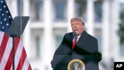 FILE - In this Jan. 6, 2021, file photo President Donald Trump speaks during a rally protesting the electoral college certification of Joe Biden as President in Washington.