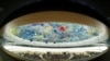 FILE - A fisheye view of the session of the Human Rights Council during a speech by U.N. High Commissioner for Human Rights Michelle Bachelet at the United Nations in Geneva, Switzerland, Feb. 27, 2020.