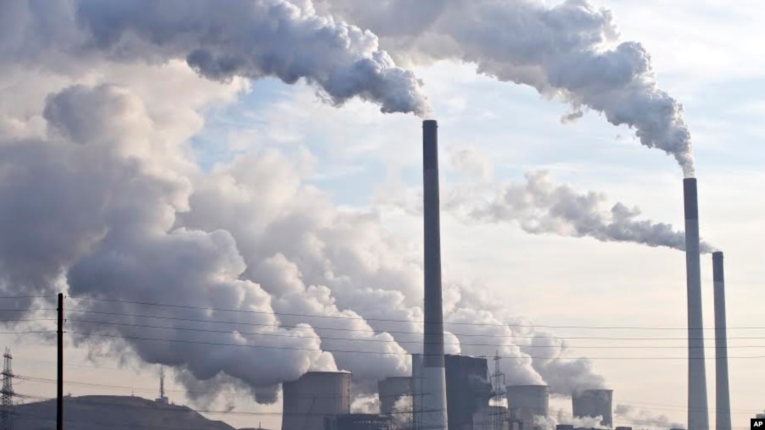 FILE - A coal-burning power plant 