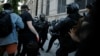 USA, Washington Police and a protester clash during a protest amid nationwide unrest following the death in Minneapolis police custody of George Floyd, at Lafayette Park near the White House