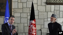 NATO Secretary-General Anders Fogh Rasmussen (l) during a joint press conference with Afghan President Hamid Karzai at the presidential palace in Kabul, March, 4, 2013. 