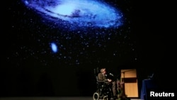 FILE - British physicist Stephen Hawking delivers a lecture on 'The Origin of the Universe' at the Heysel conference hall in Brussels, May 20, 2007.
