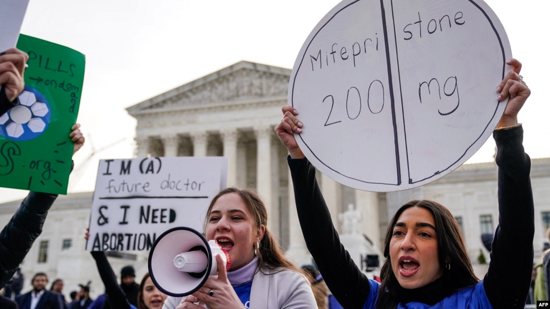 Abortion rights activists rally in front of the U.S. Supreme Court on March 26, 2024, in Washington. 
