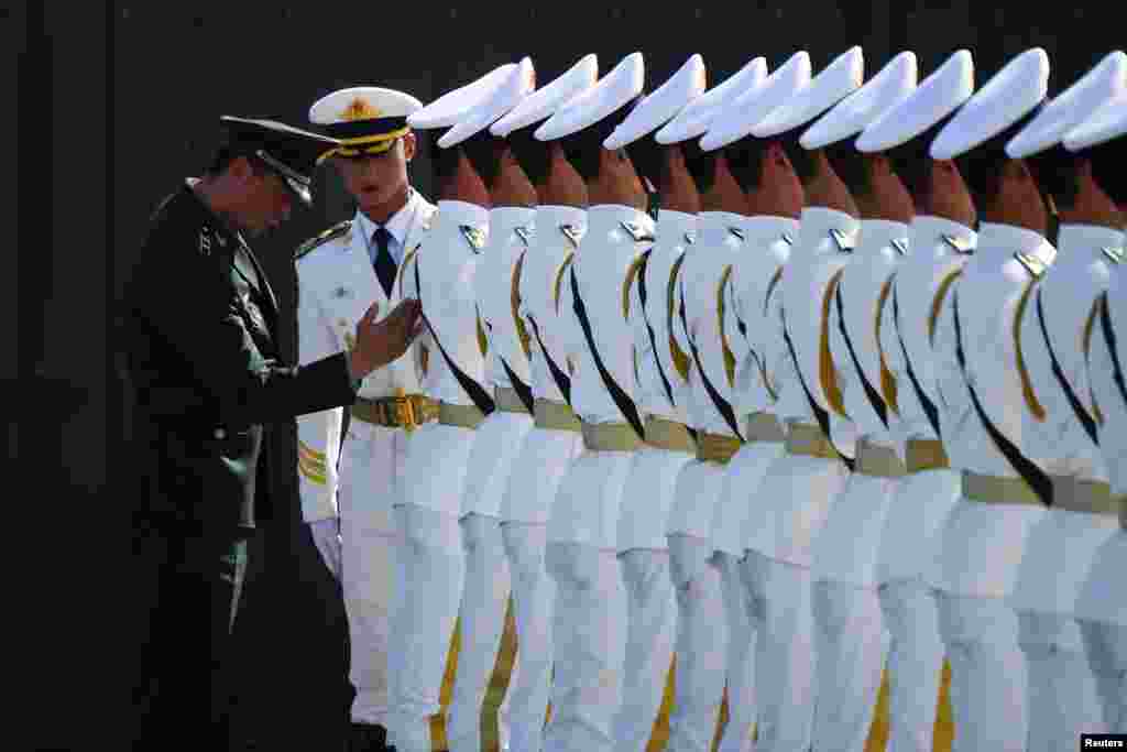 Chinese troops take part in marching drills ahead of an Oct. 1 military parade to celebrate the 70th anniversary of the founding of the People's Republic of China at a camp on the outskirts of Beijing.