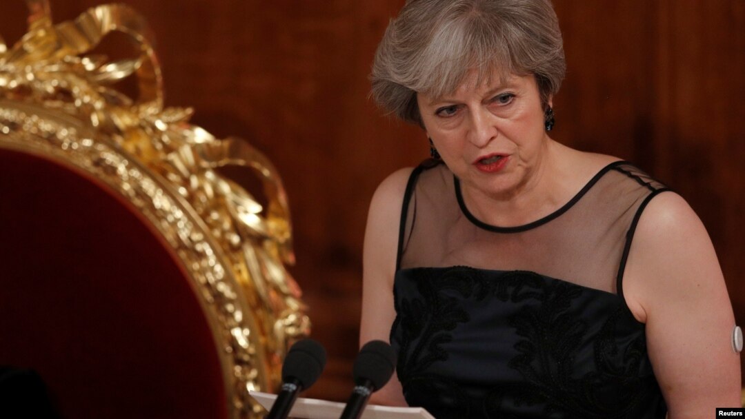 FILE - Britain's Prime Minister Theresa May speaks at the Lord Mayor's Banquet at the Guildhall, in London, Britain, Nov. 13, 2017.