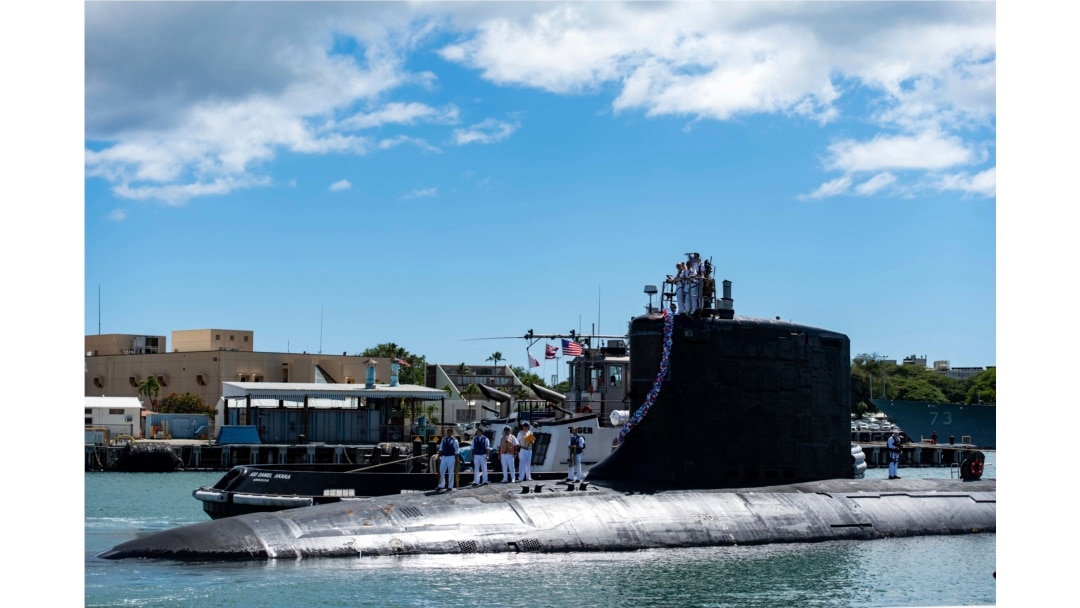 In this photo provided by U.S. Navy, the Virginia-class fast-attack submarine USS Illinois (SSN 786) returns home to Joint Base Pearl Harbor-Hickam from a deployment in the 7th Fleet area of responsibility on Sept. 13, 2021.